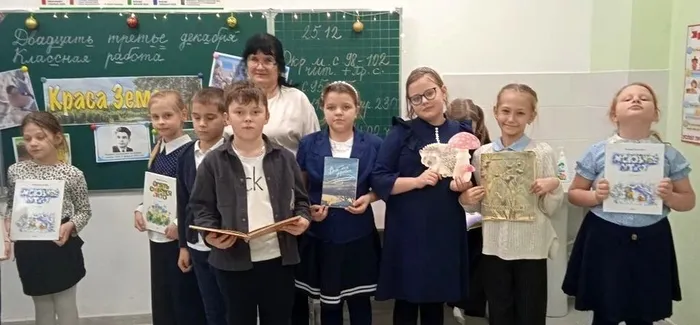 с книгами Т. Белозерова